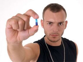 a man who takes pills to increase strength